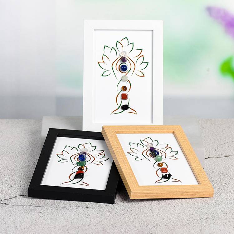 Seven chakras tree-like crystal stone picture frame on the table